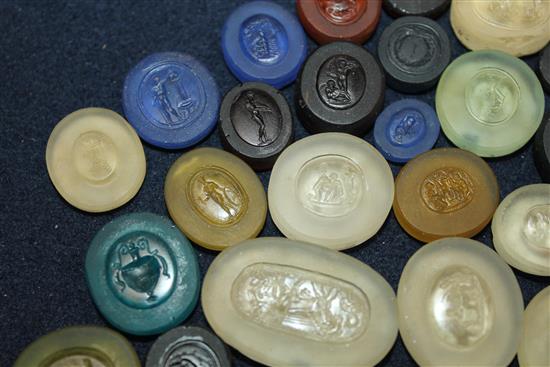 A collection of thirty seven various unmounted hardstone and glass Grand Tour intaglios, largest 1.5in.